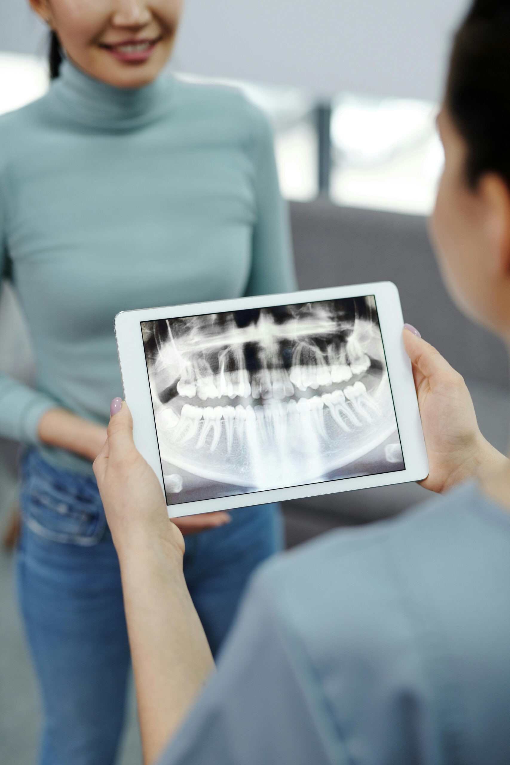 Dentist providing personalised dental care at Smile City Center